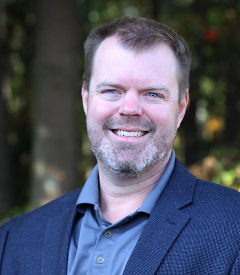 headshot of TJ Greenier