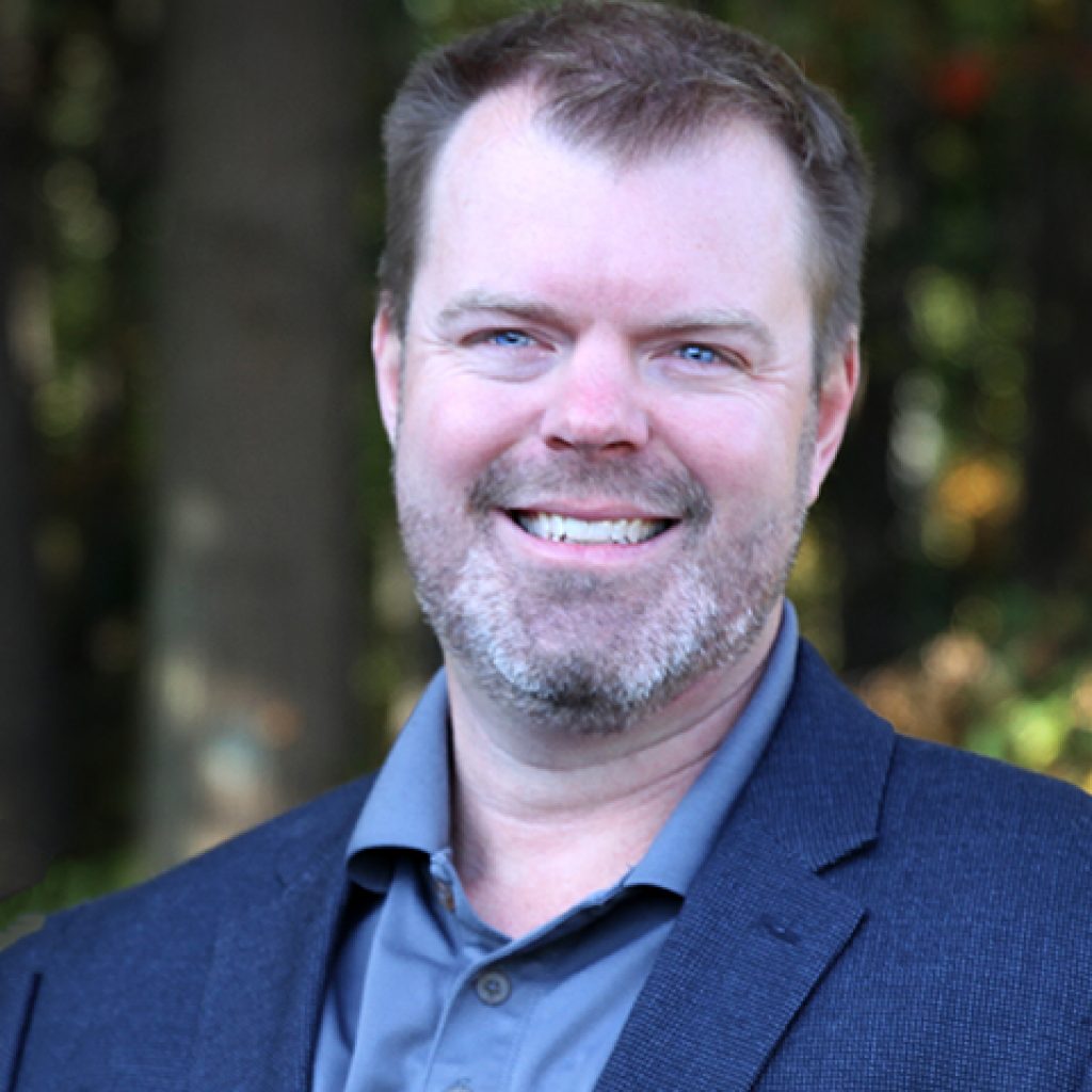 headshot of TJ Greenier