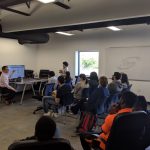 Bill Farmer presents a NiFi dataflow to a group of UMD iSchool students and staff at the Clarity office